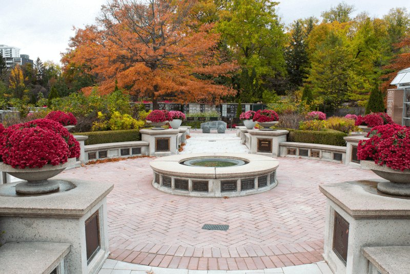 A photograph of the Garden of Remembrance: a formal garden with urns and planting